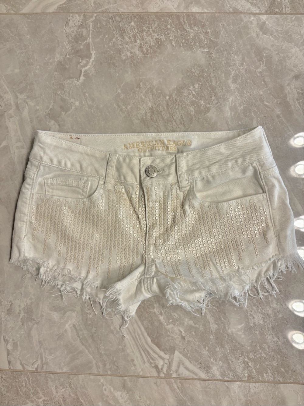 Vintage American Eagle Outfitters White Sequin Frayed Denim Shorts
